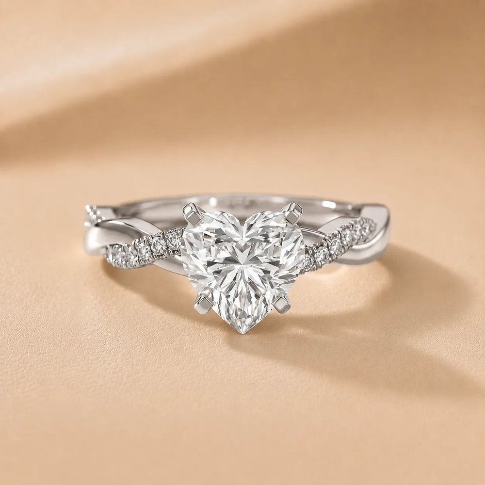 Twisted Side Stone Round Diamond Engagement Ring