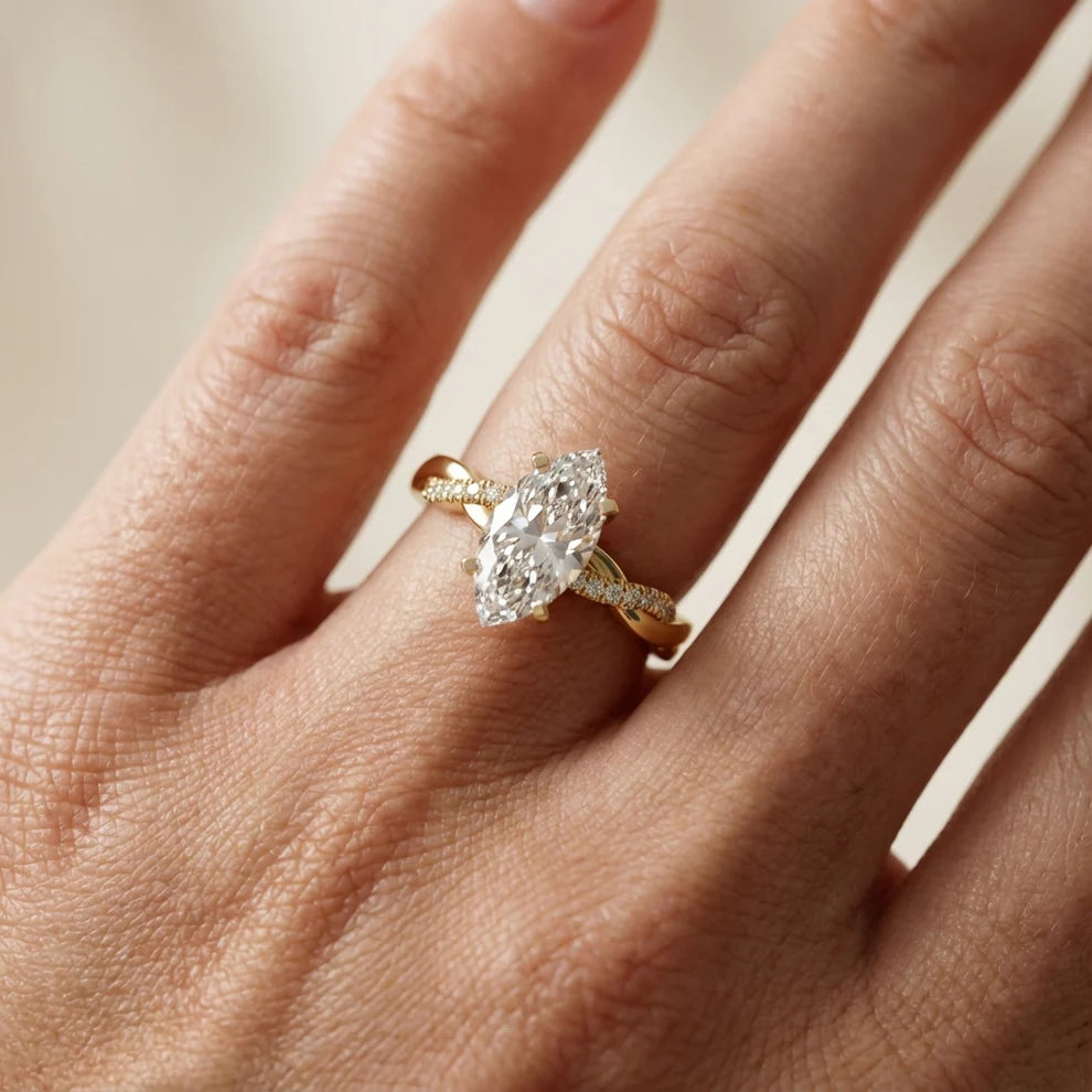 Twisted Side Stone Round Diamond Engagement Ring