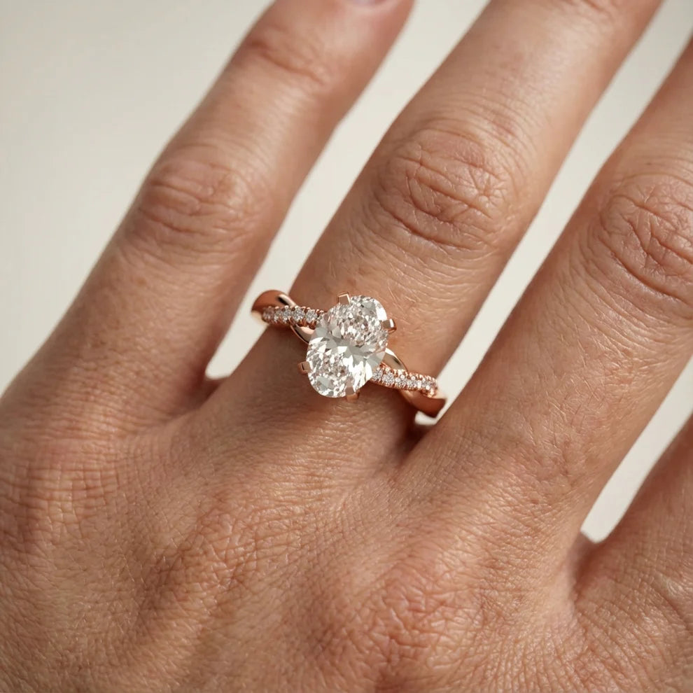 Twisted Side Stone Round Diamond Engagement Ring