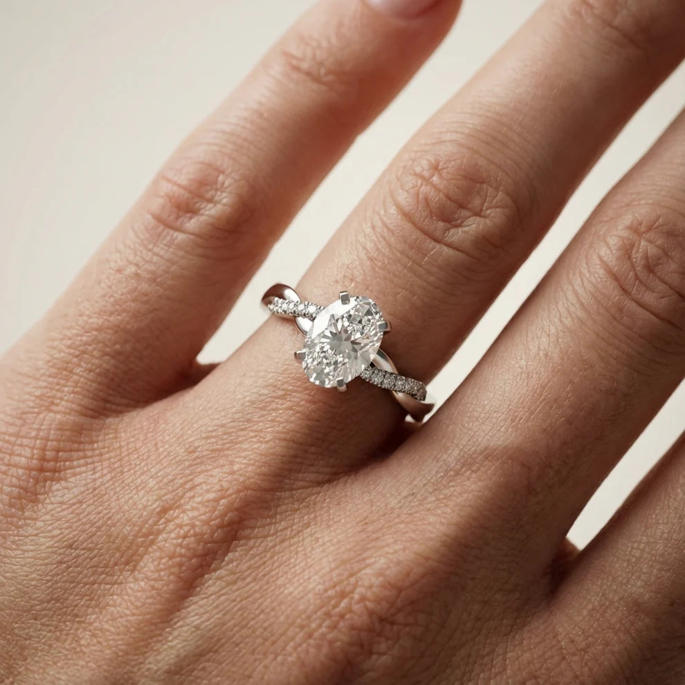Twisted Side Stone Round Diamond Engagement Ring