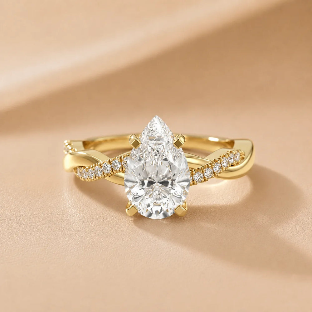 Twisted Side Stone Round Diamond Engagement Ring