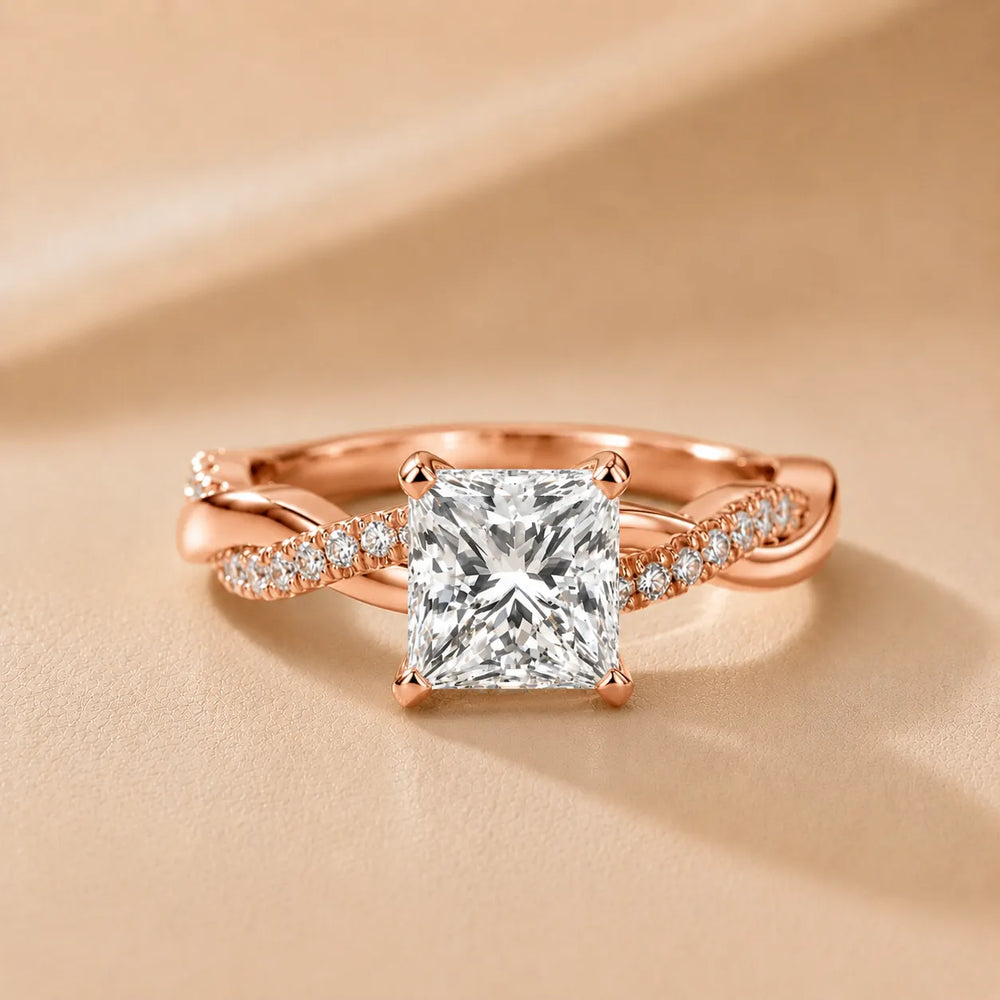 Twisted Side Stone Round Diamond Engagement Ring