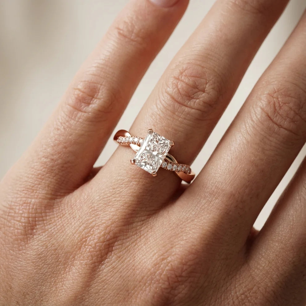 Twisted Side Stone Round Diamond Engagement Ring