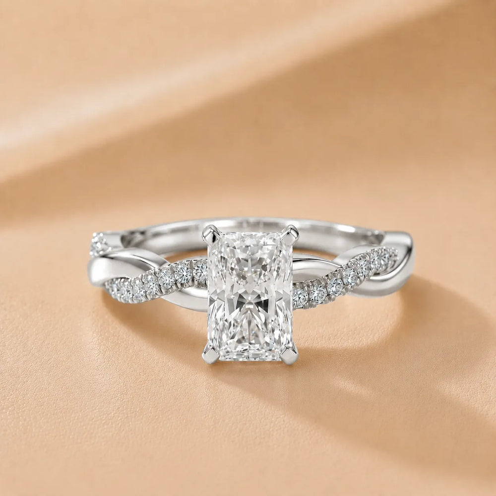 Twisted Side Stone Round Diamond Engagement Ring