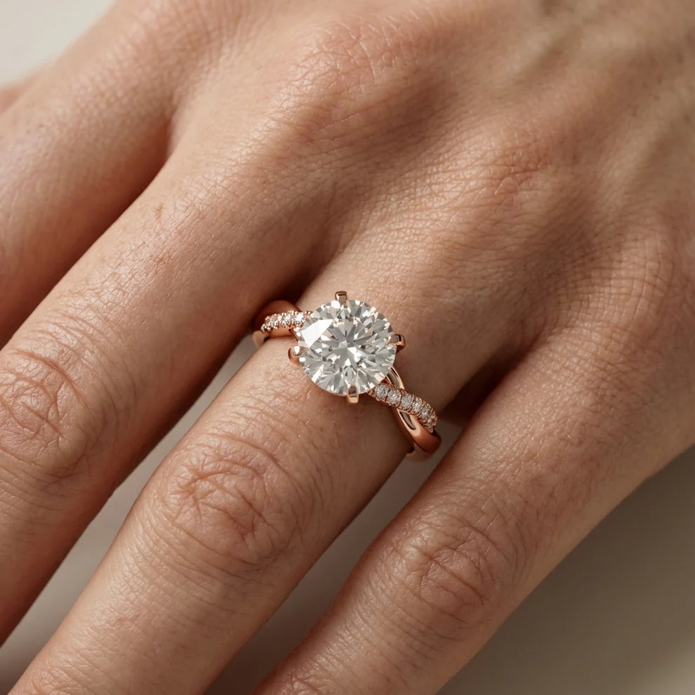Twisted Side Stone Round Diamond Engagement Ring