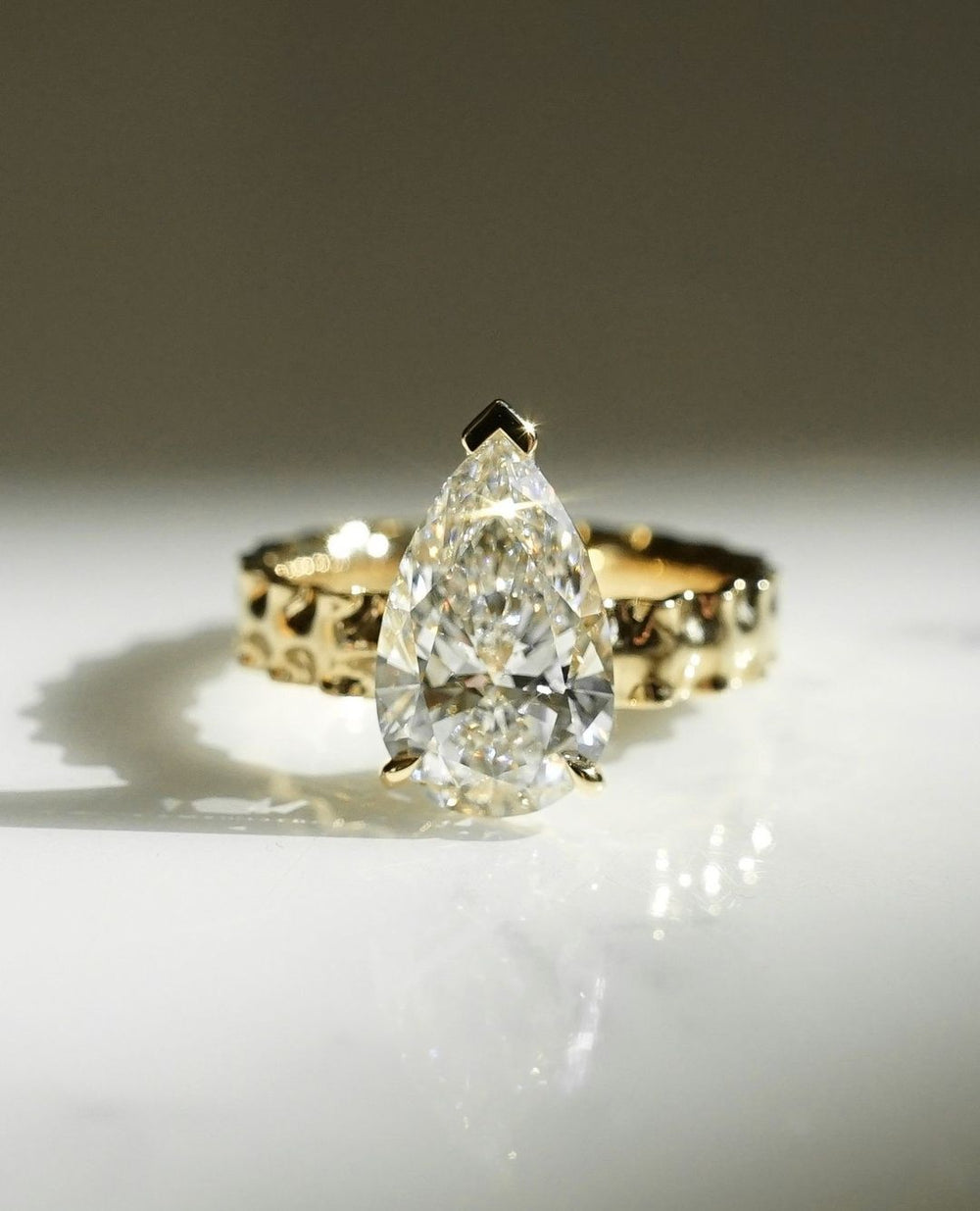 Lasagna Band Elongated Pear Cut Labgrown Engagement Ring