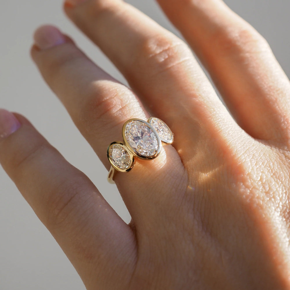 Bezel Set Three Stone Oval Cut Labgrown Engagement Ring