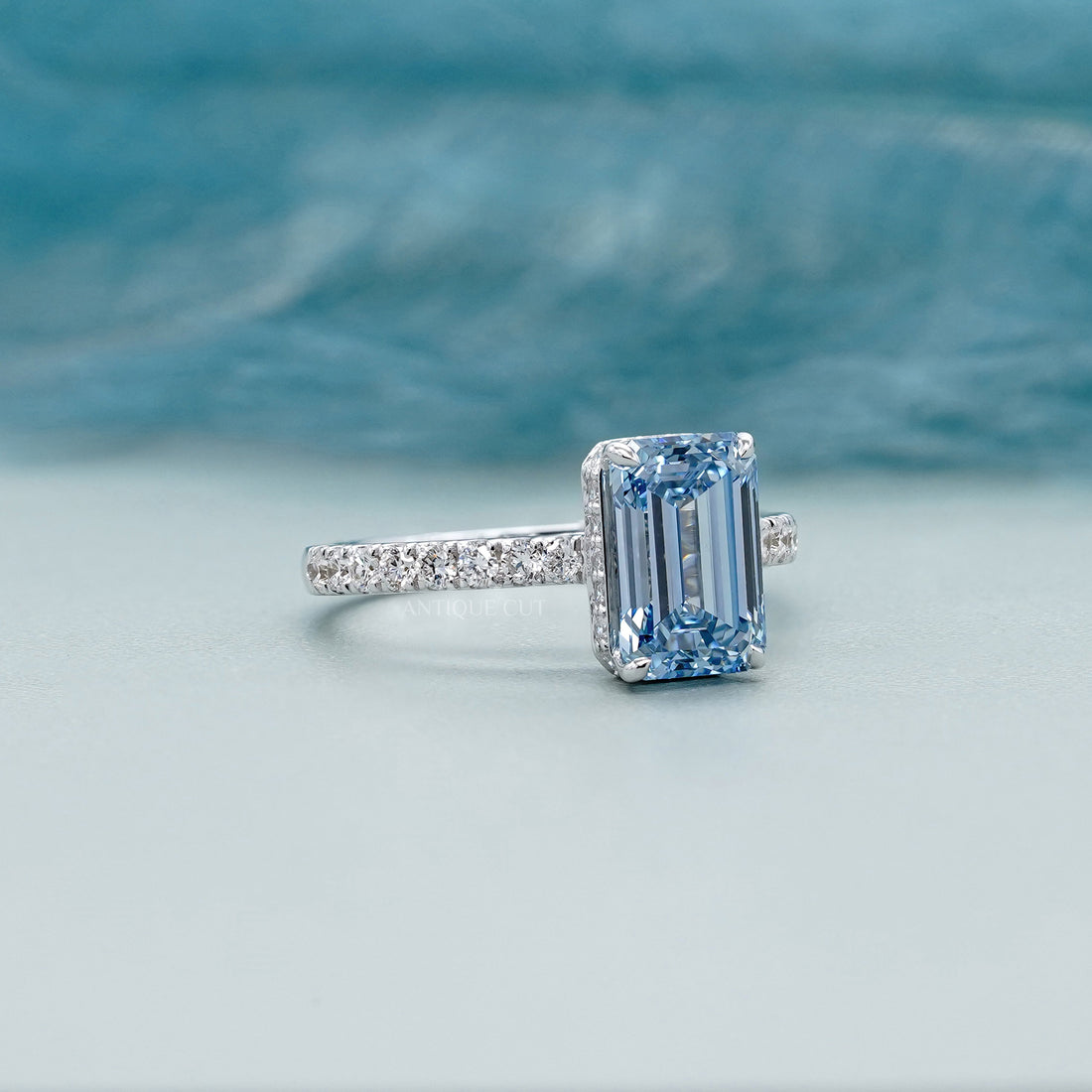 Fancy Blue 2.40tcw Emerald Cut Lab Diamond Engagement Ring | IGI Certified | White Gold Pave Setting