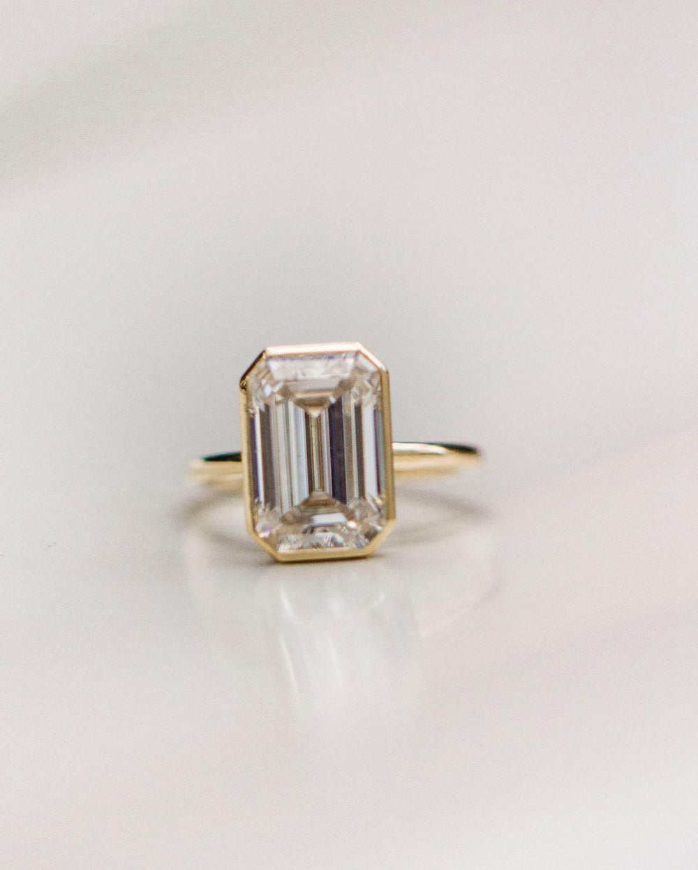 Bezel Set Emerald Cut Labgrown Ring