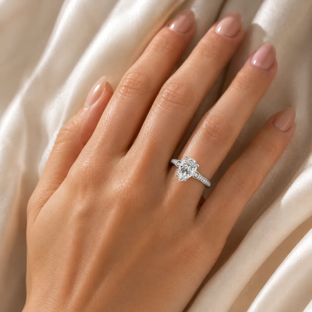 Vintage-Inspired Solitaire Ring with Accent Stone Details