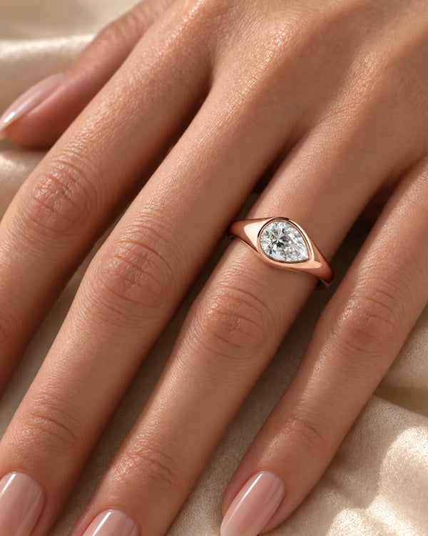 Bezel Set Elongated Pear Cut Labgrown Engagement Ring