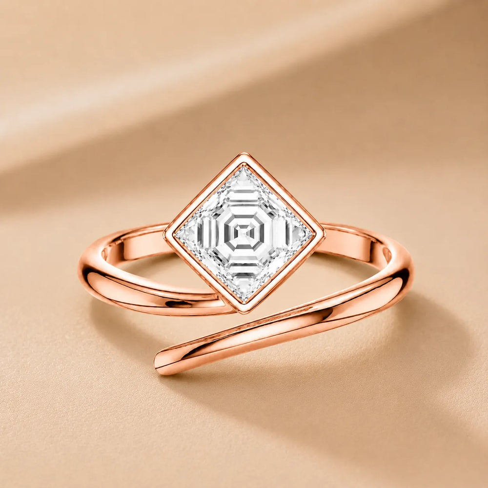 Elegant Pear-Cut Bezel Wrap Diamond Ring