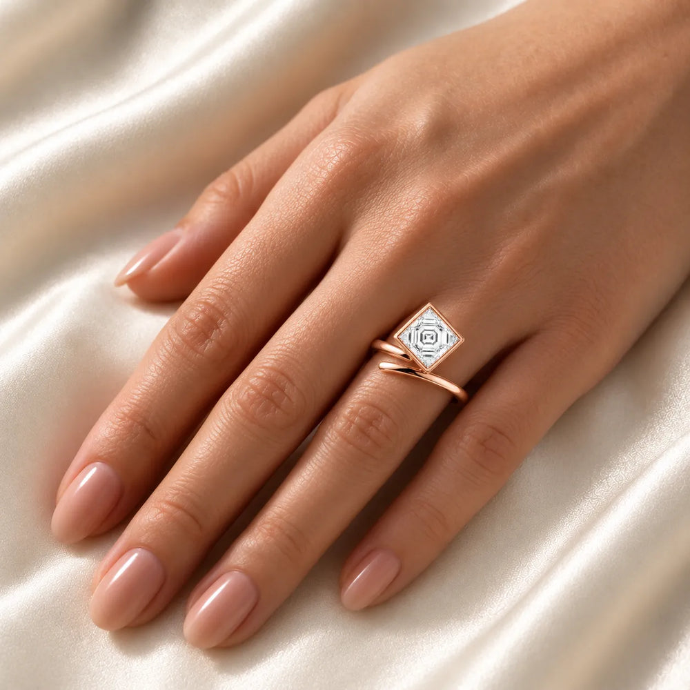 Elegant Pear-Cut Bezel Wrap Diamond Ring