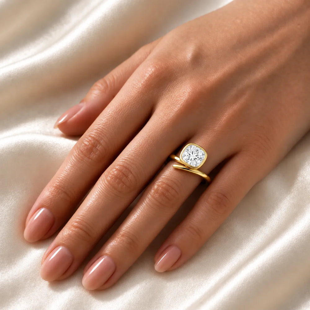 Elegant Pear-Cut Bezel Wrap Diamond Ring