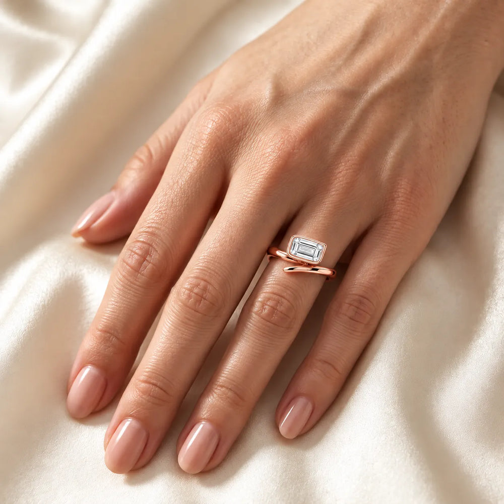 Elegant Pear-Cut Bezel Wrap Diamond Ring