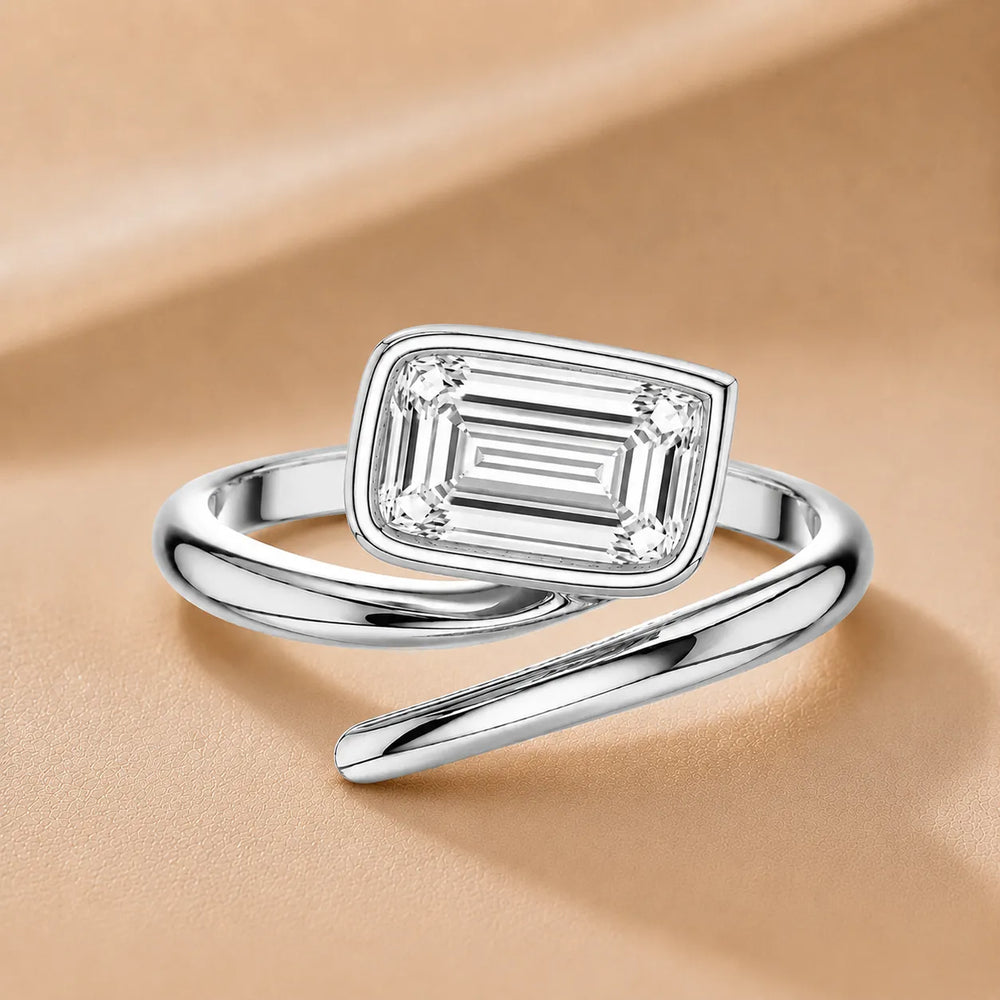 Elegant Pear-Cut Bezel Wrap Diamond Ring