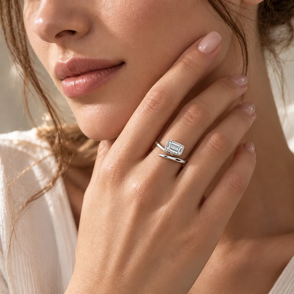 Elegant Pear-Cut Bezel Wrap Diamond Ring
