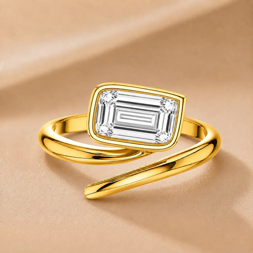 Elegant Pear-Cut Bezel Wrap Diamond Ring