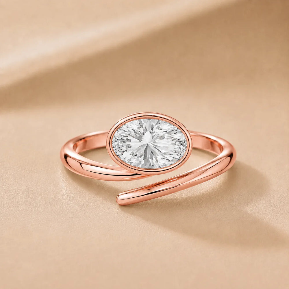 Elegant Pear-Cut Bezel Wrap Diamond Ring