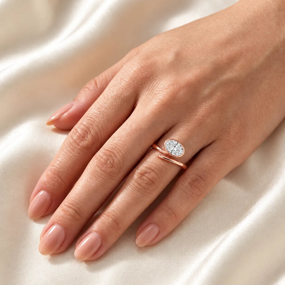 Elegant Pear-Cut Bezel Wrap Diamond Ring