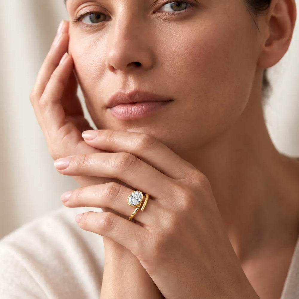 Elegant Pear-Cut Bezel Wrap Diamond Ring