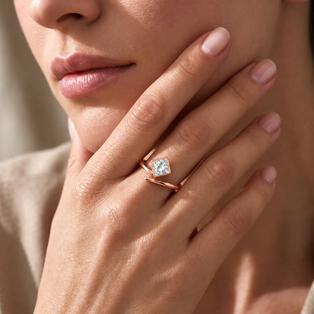 Elegant Pear-Cut Bezel Wrap Diamond Ring