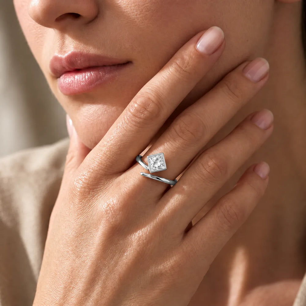 Elegant Pear-Cut Bezel Wrap Diamond Ring