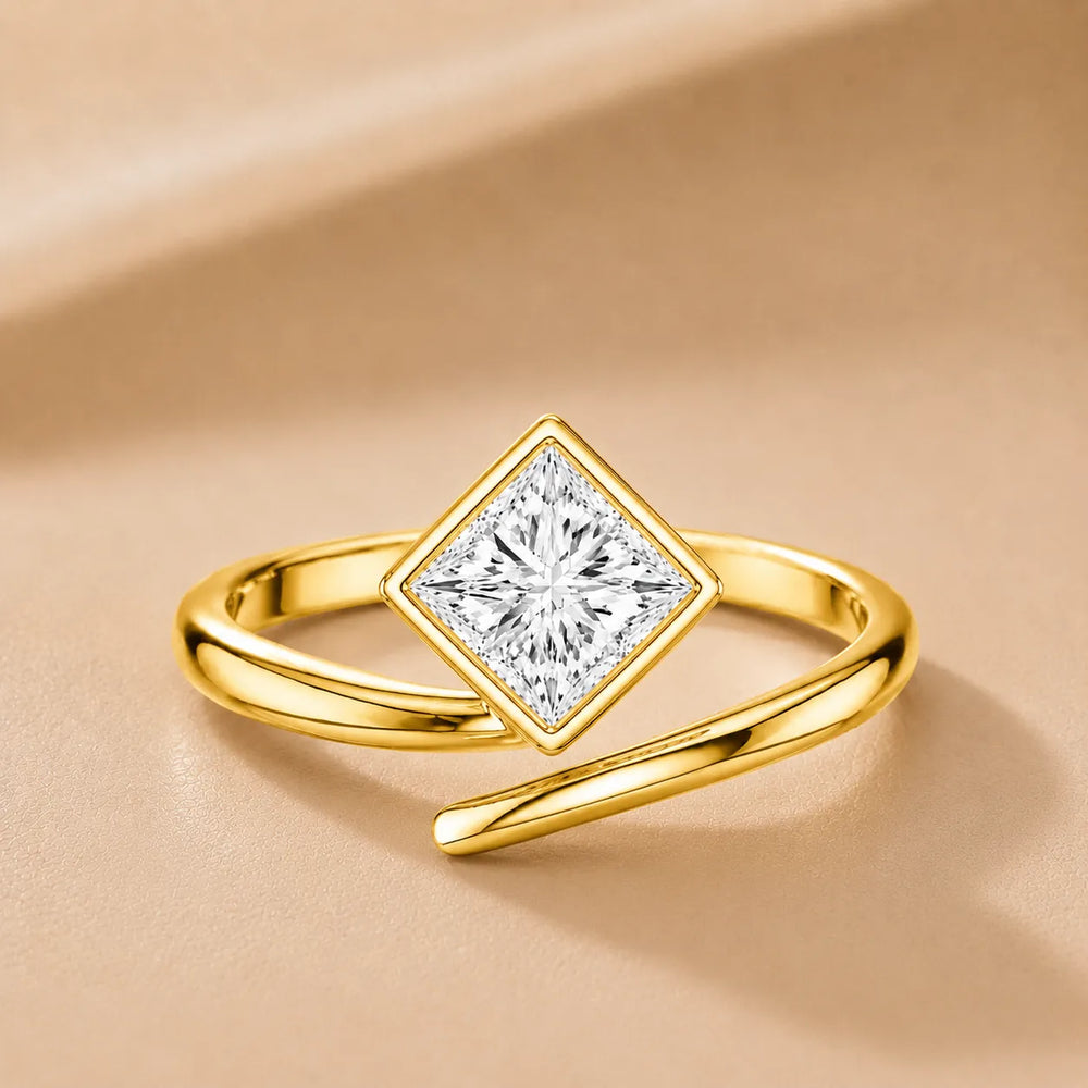 Elegant Pear-Cut Bezel Wrap Diamond Ring