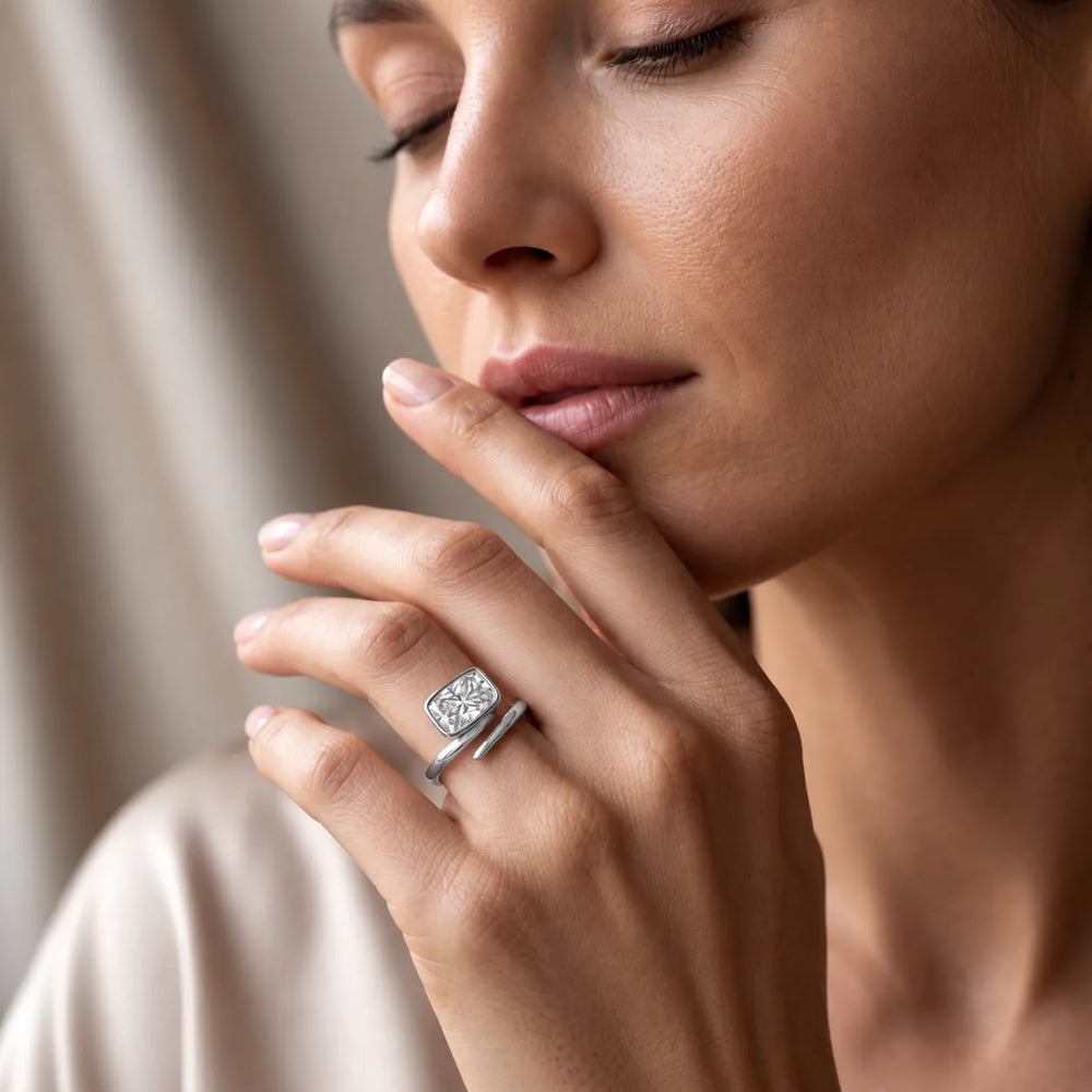 Elegant Pear-Cut Bezel Wrap Diamond Ring