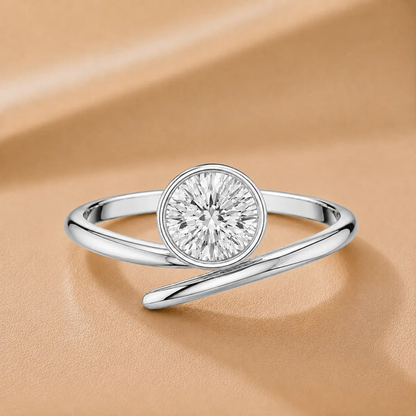 Elegant Pear-Cut Bezel Wrap Diamond Ring