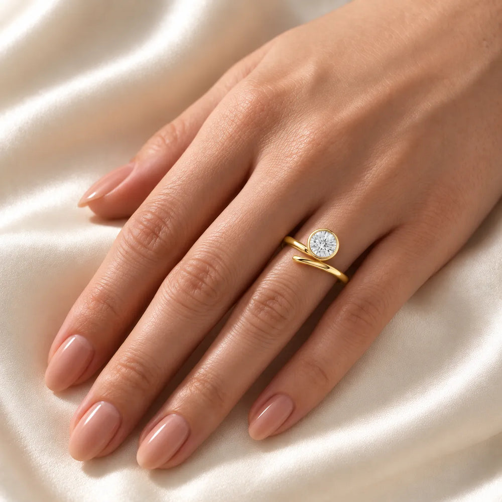 Elegant Pear-Cut Bezel Wrap Diamond Ring