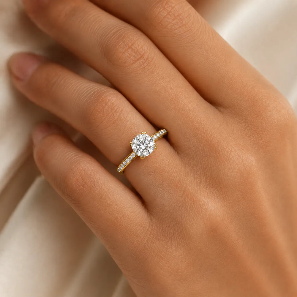 Classic Solitaire Ring with Channel-Set Accent Stones