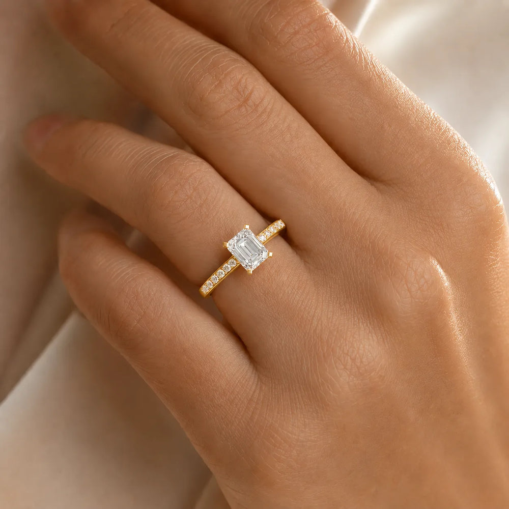 Classic Solitaire Ring with Channel-Set Accent Stones