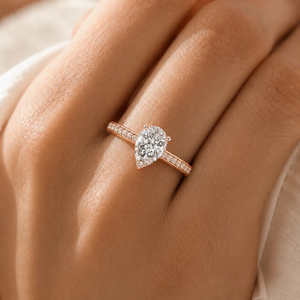 Classic Solitaire Ring with Channel-Set Accent Stones