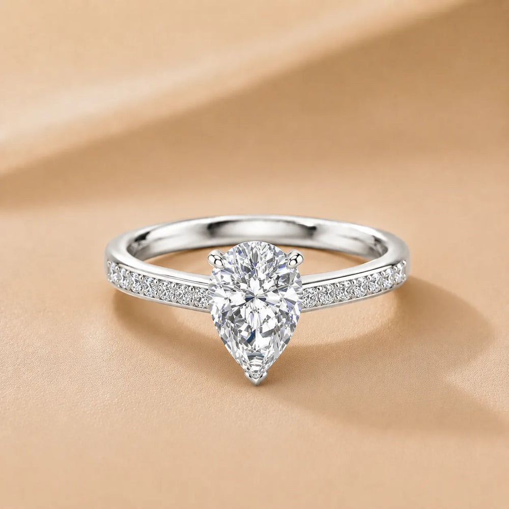 Classic Solitaire Ring with Channel-Set Accent Stones