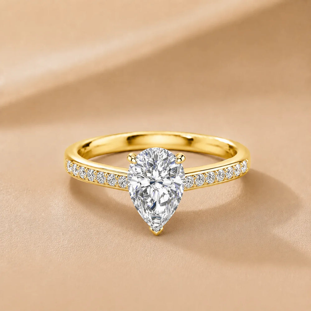 Classic Solitaire Ring with Channel-Set Accent Stones