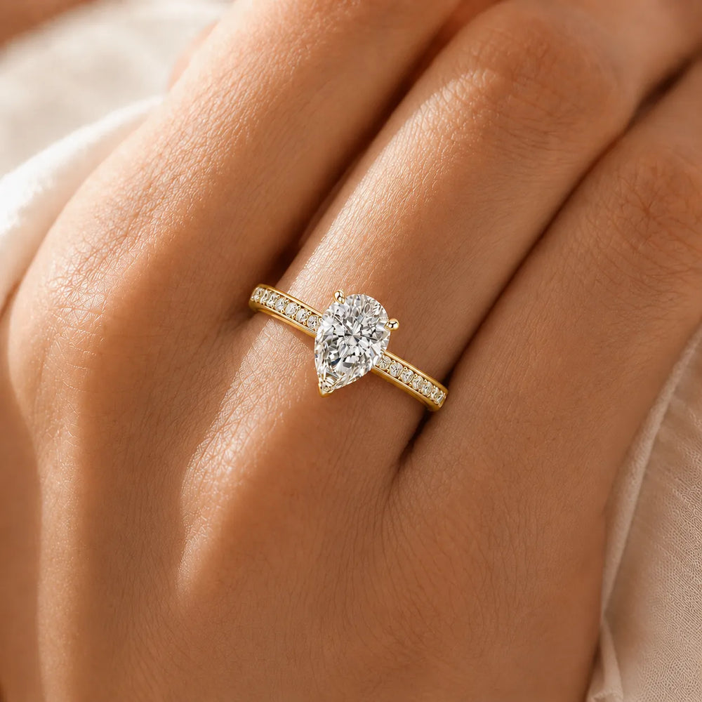 Classic Solitaire Ring with Channel-Set Accent Stones