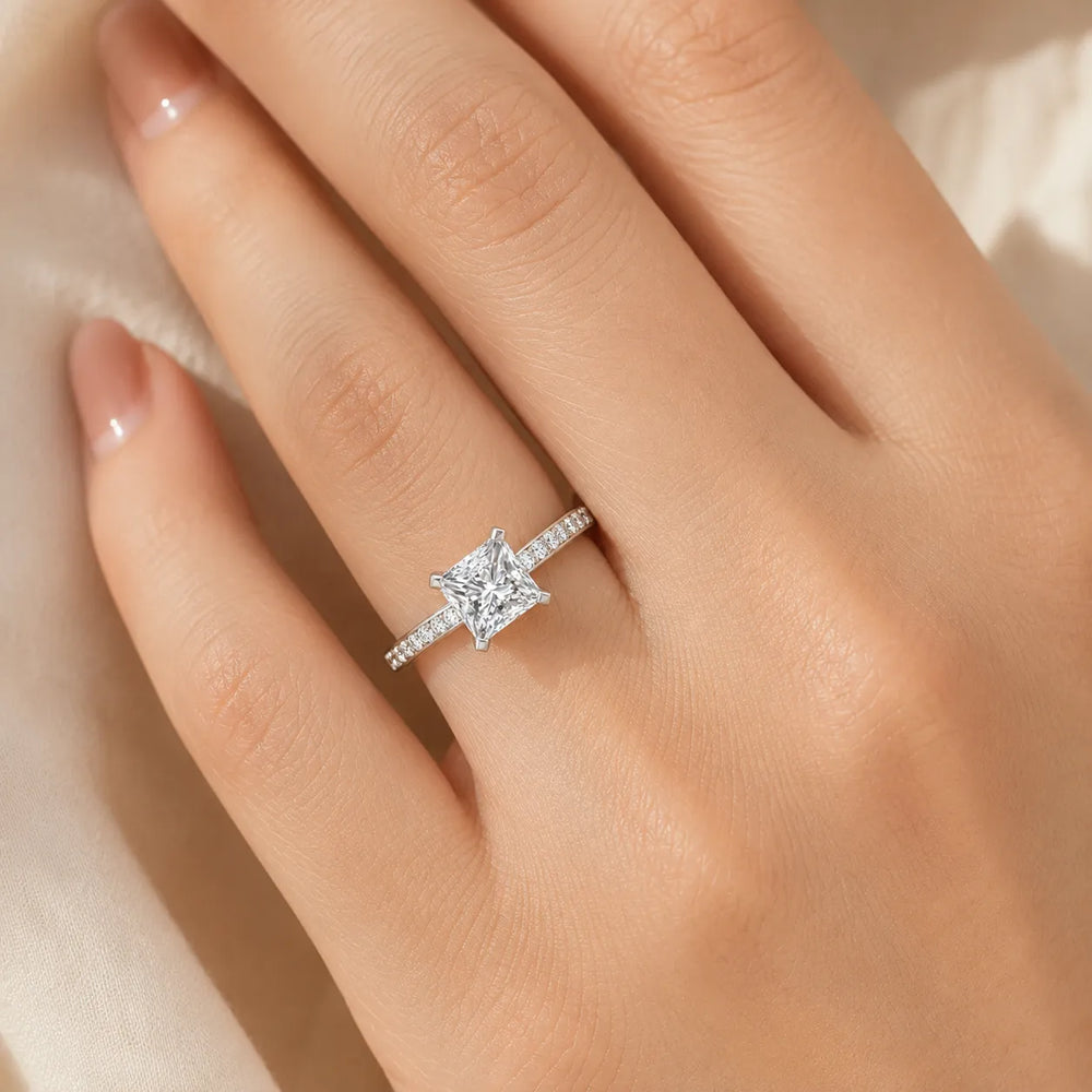 Classic Solitaire Ring with Channel-Set Accent Stones