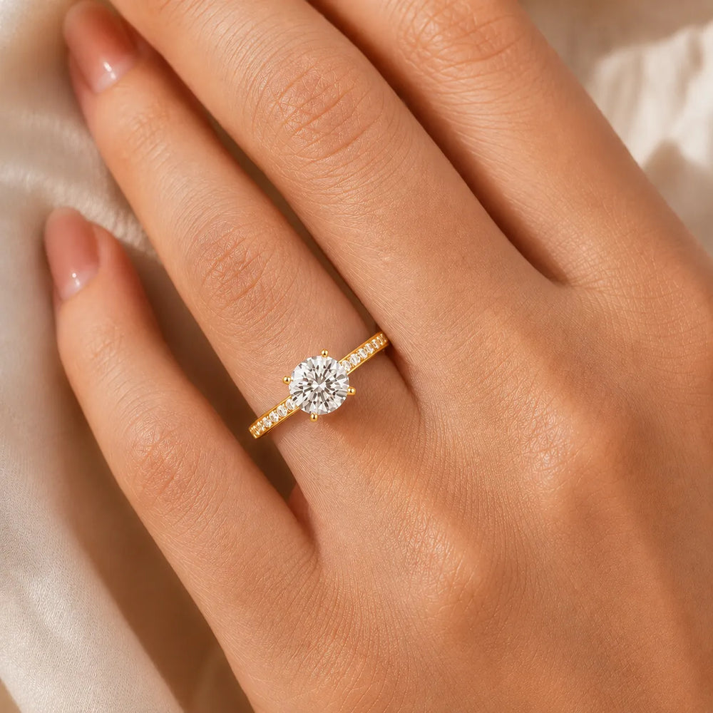 Classic Solitaire Ring with Channel-Set Accent Stones