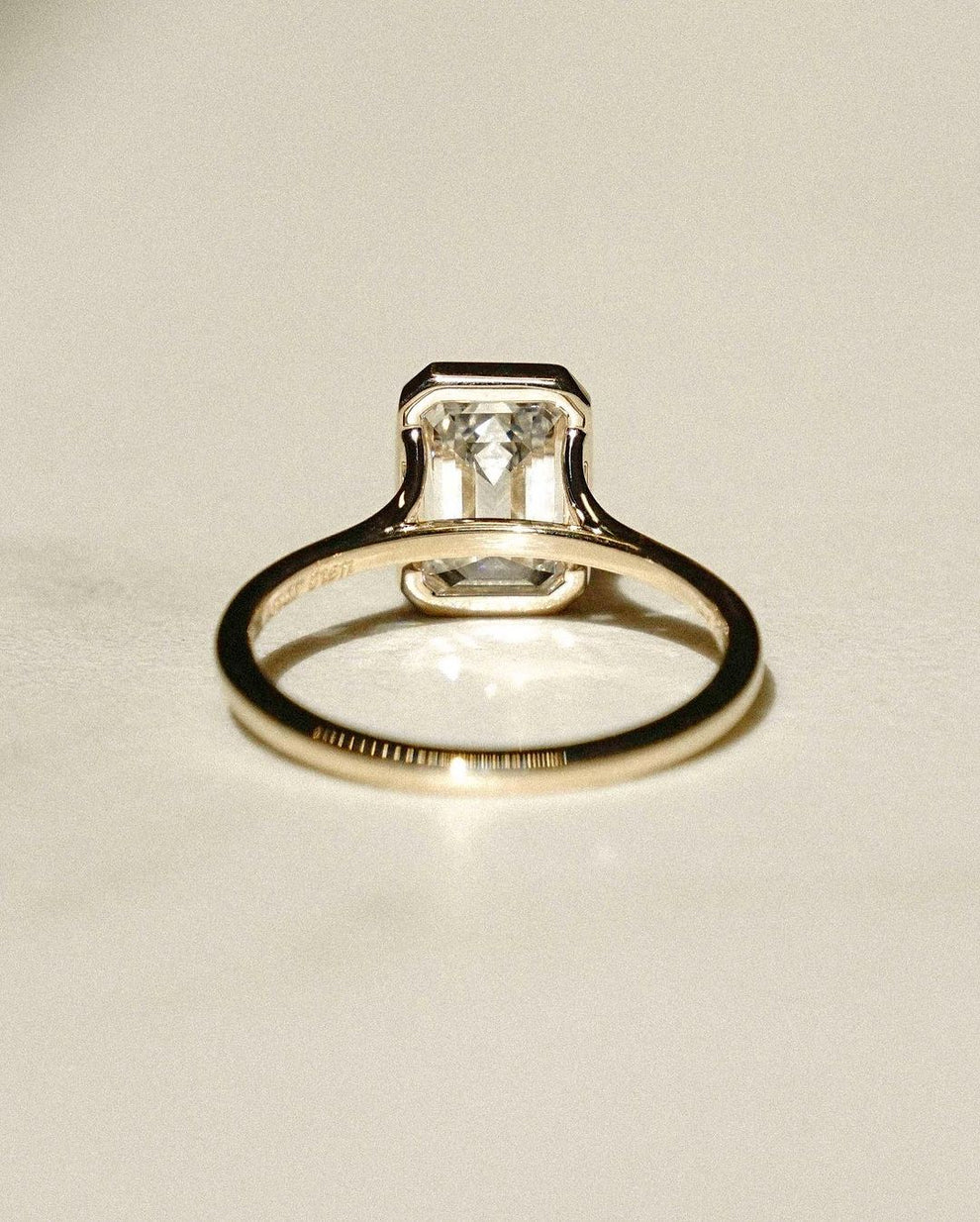 Bezel Set 2.60 Ct Emerald Cut Lab Grown Diamond Engagement Ring | IGI Certified