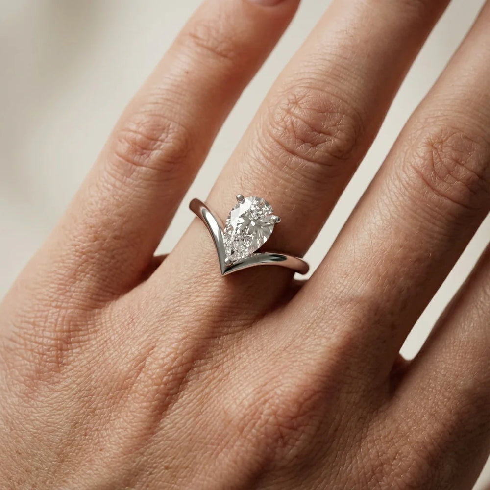 Evelyn Chevron Solitaire Round Diamond Engagement Ring