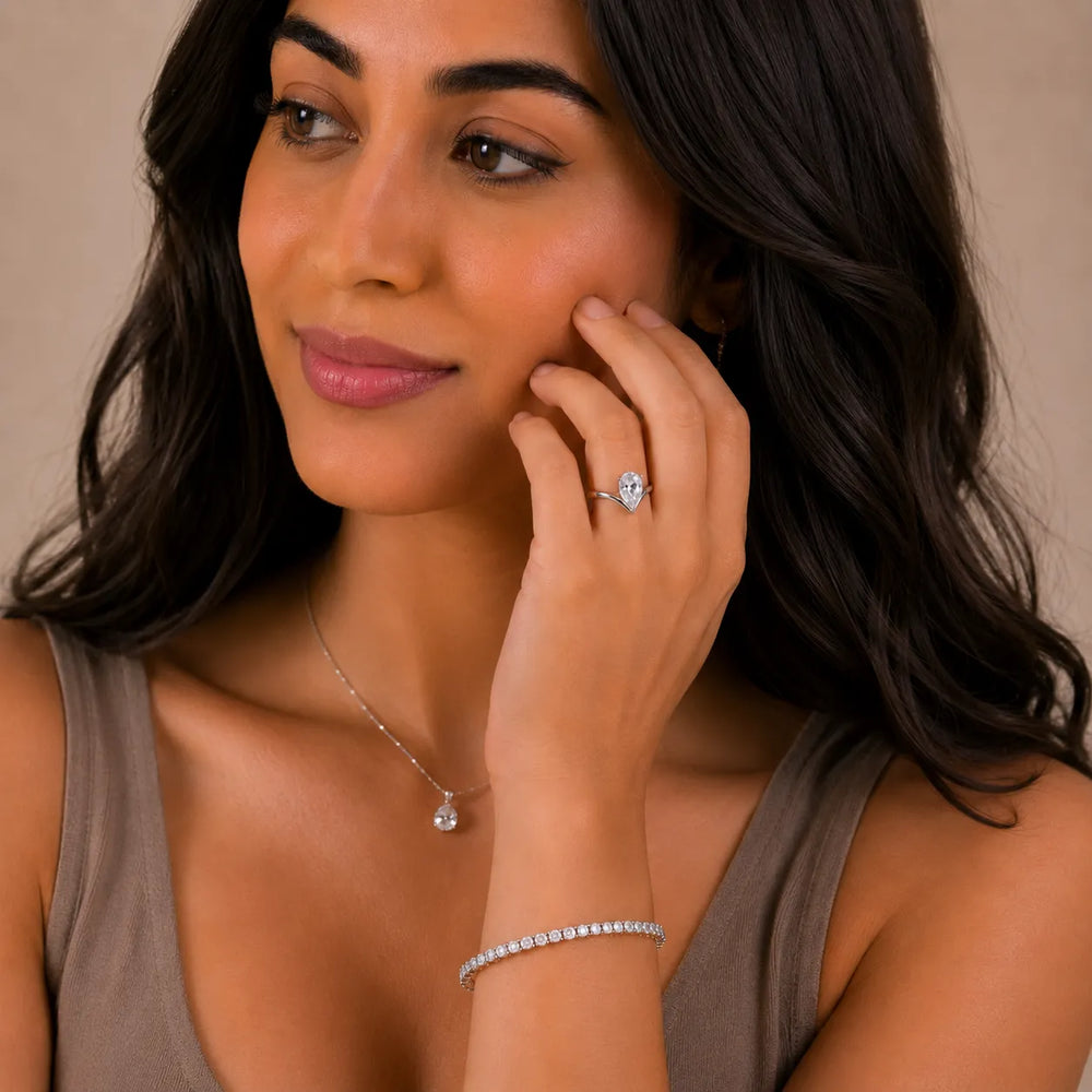 Evelyn Chevron Solitaire Round Diamond Engagement Ring