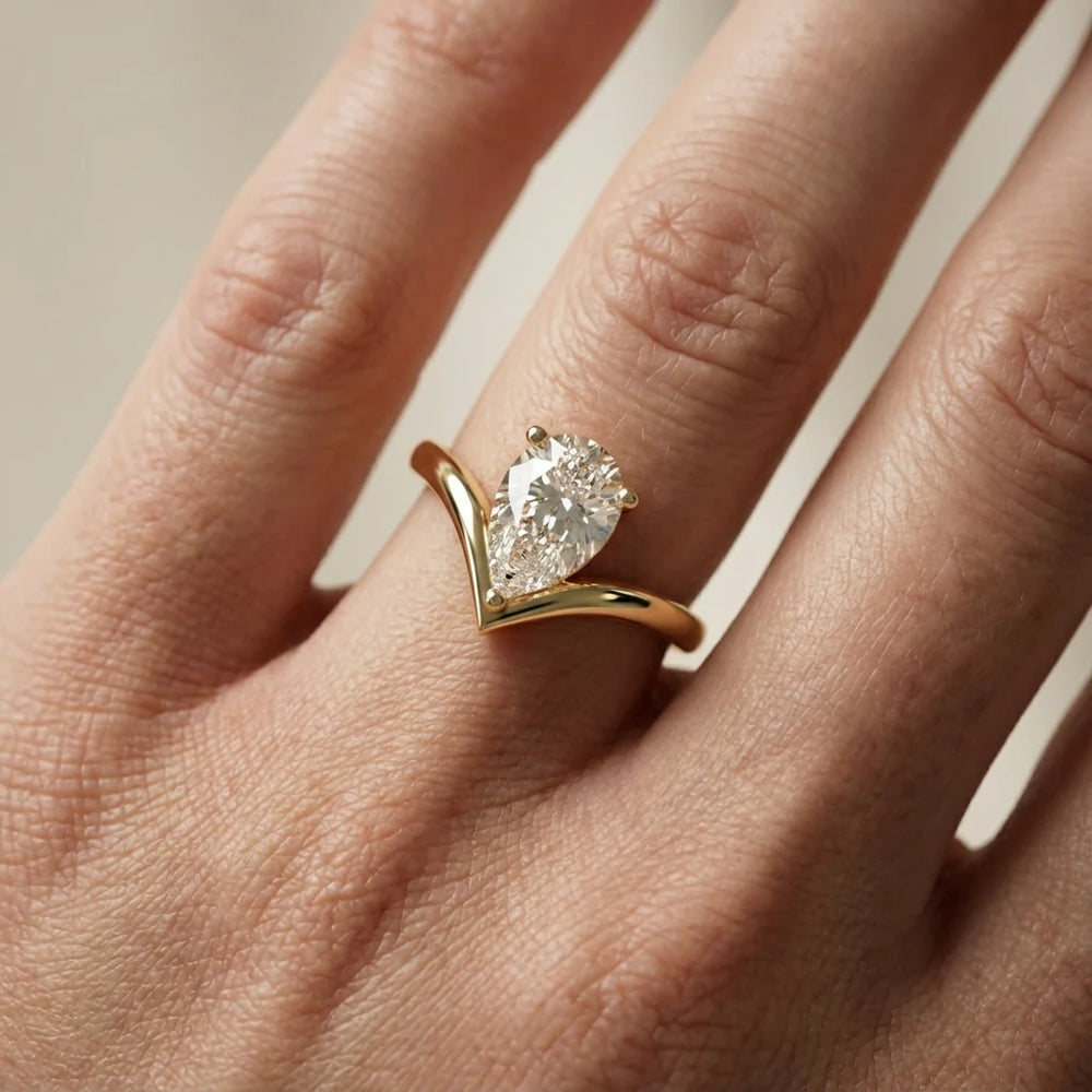 Evelyn Chevron Solitaire Round Diamond Engagement Ring