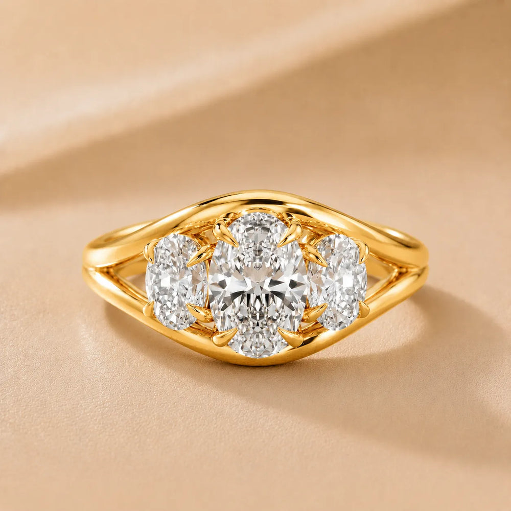 Exquisite Three-Stone Oval Diamond Engagement Ring