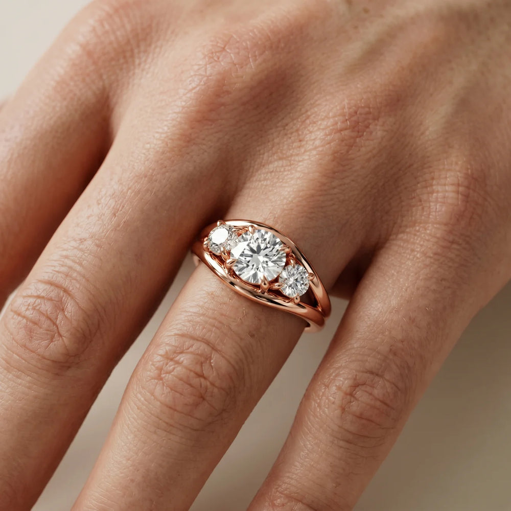 Exquisite Three-Stone Oval Diamond Engagement Ring