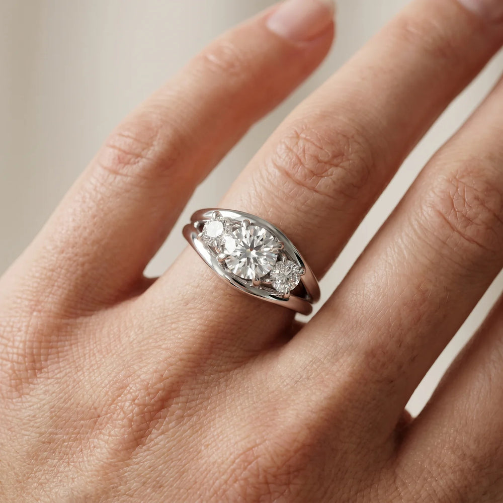 Exquisite Three-Stone Oval Diamond Engagement Ring