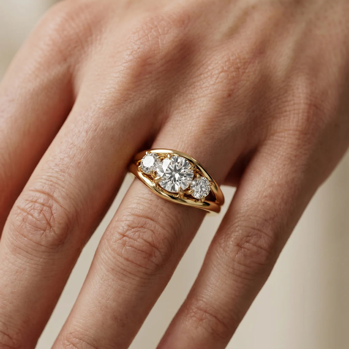 Exquisite Three-Stone Oval Diamond Engagement Ring