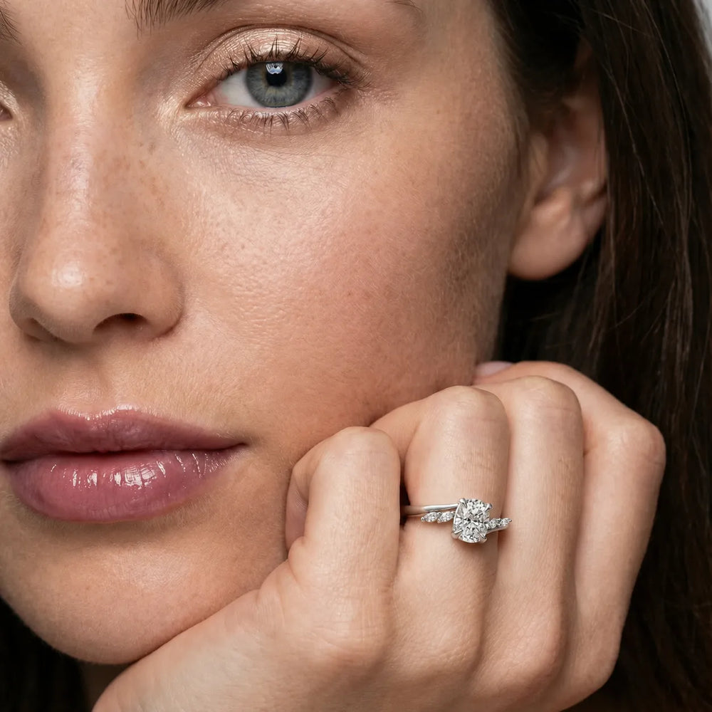 Flora Twist Side Stone Oval Diamond Engagement Ring