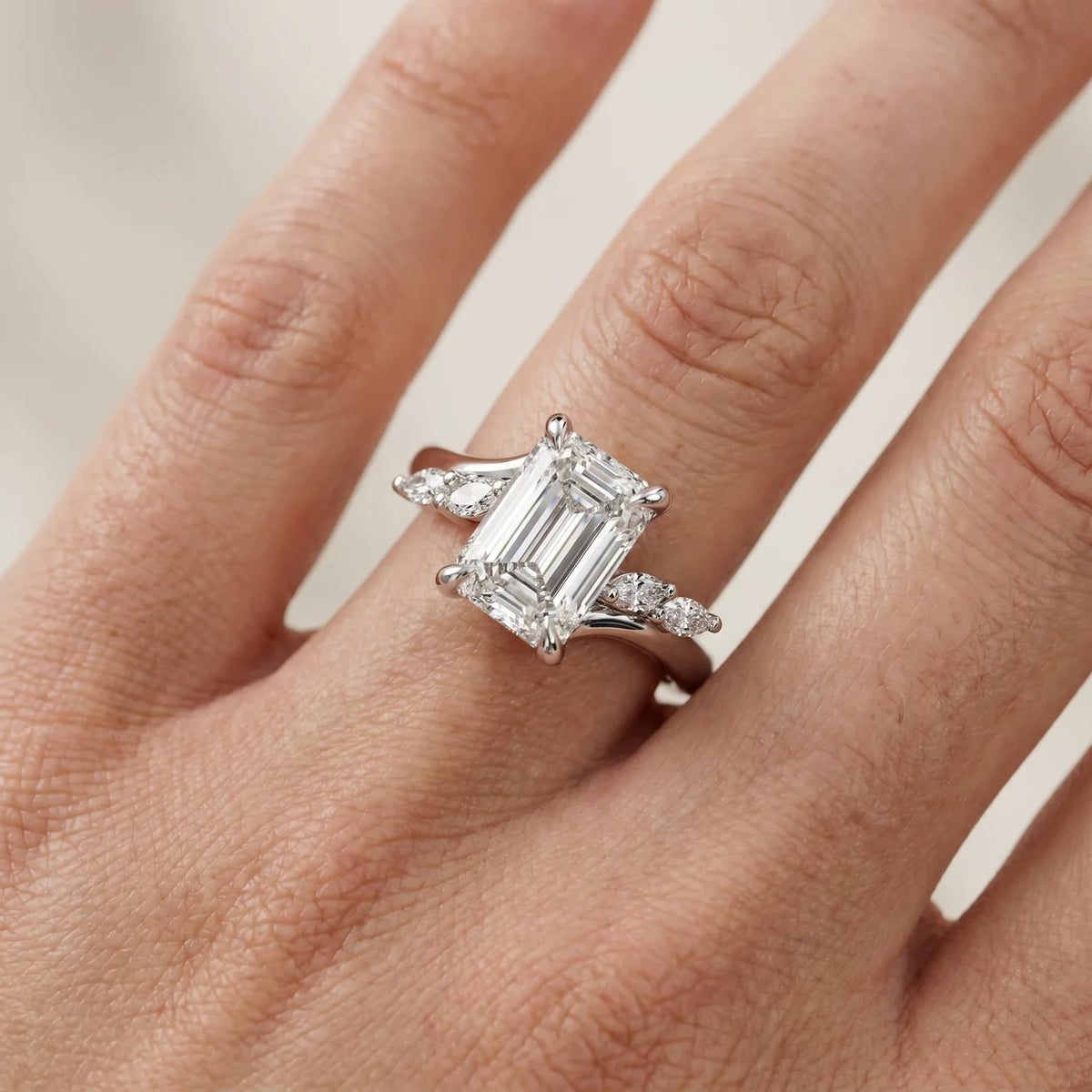 Flora Twist Side Stone Oval Diamond Engagement Ring