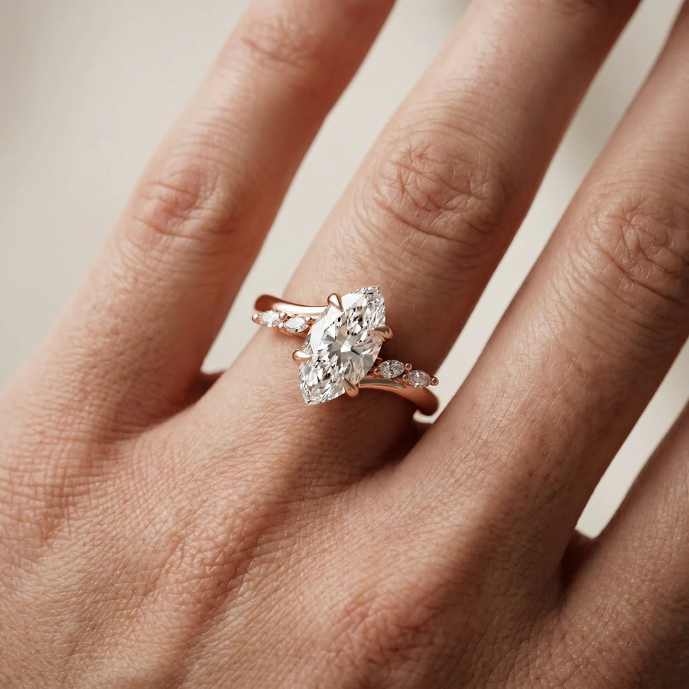 Flora Twist Side Stone Oval Diamond Engagement Ring